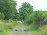 Looking back to the road bridge at Mossdale. This route was once the railway line connectrimng Castle Douglas to Portpatrick. The line became disused during the Beeching Closures but is popular today as a footpath from Mossdale (formerly New Galloway Railway Station) to Loch Stroan and beyond. Mossdale Walk follows the 'Paddy Line' before heading into fields and woodlands.